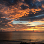 Cloudy and colorful sunrise over the Atlantic Ocean in Orchid
