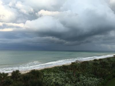 A view over the Atlantic Ocean with ominous clouds overhead