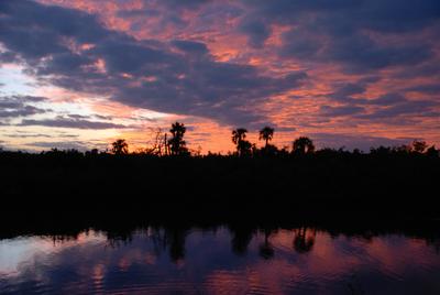 A colorful evening sky is reflected in the Indian River Lagoon's conservation area.