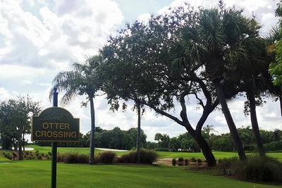 A sign at the entrance to Orchid that reads "Otter Crossing" with a picture of an otter.