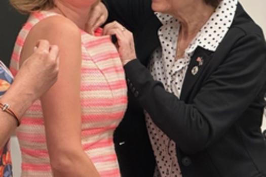 Orchid Town Manager Cherry Stowe receives her Master Municipal Clerk pin from FACC President Patricia Burke
