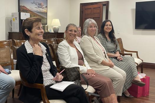 Local Municipal Clerks from Indian River Shores, Sebastian and Fellsmere sit next to Florida Association of City Clerks President Patricia Burke at Orchid's Town Hall.